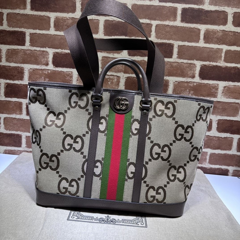 G*u*i shopping bags